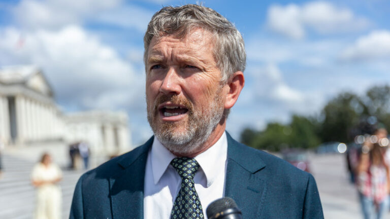 Thomas Massie speaks to reporters outside of the capitol.