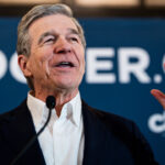 Roy Cooper speaks at a campaign event.