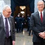 Chuck Schumer and John Thune in the Capitol.