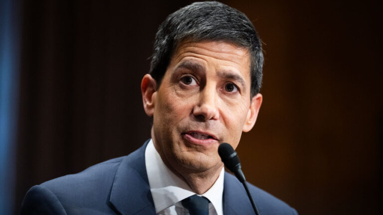 Kevin Warsh speaks in the Senate banking committee.