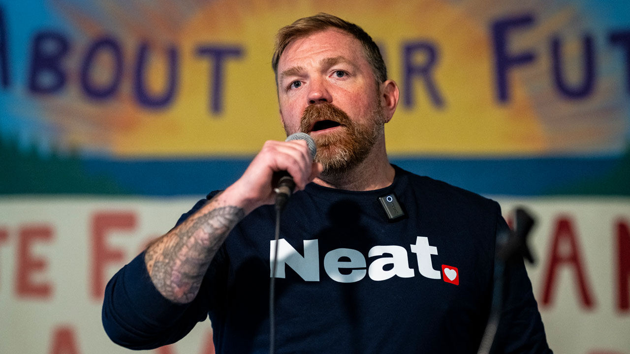 Home 4 Graham Platner speaks at a rally.