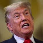 President Donald Trump speaks to reporters at the Capitol.