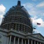 Obama Celebrates a Drop in the Budget Deficit as the National Debt Balloons
