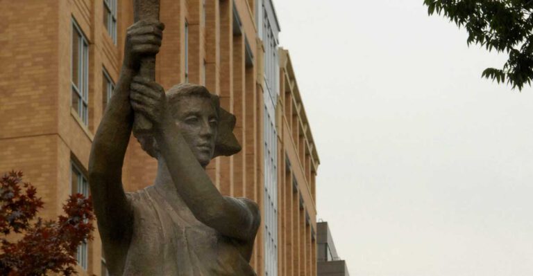 Protesters Make Obscene Gesture at Victims of Communism Memorial