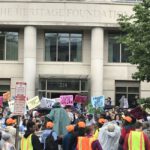 Demonstrators Descend on Heritage Foundation to Protest Trump Budget