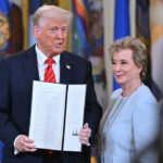 President Donald Trump and Department of Education Secretary Linda McMahon Standing