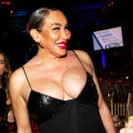 Transgender activist in a gown at a charity dinner
