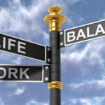 A street sign with three words on it, Life, Work, and Balance.