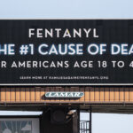A billboard says fentanyl is the number one cause of death for Americans ages 18 to 45