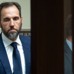 Special counsel Jack Smith outside the courtroom looking pensive