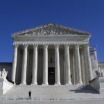 A picture of the United States Supreme Court building during the day.