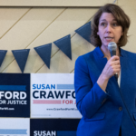 Backed by Democrats, Wisconsin Supreme Court candidate Susan Crawford speaks to supporters on Sunday in Racine, Wis.