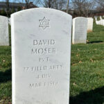The new tombstone for Army Pvt. David Moser, with a Star of David, at Arlington National Cemetery