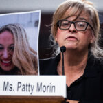 Patty Morin holds a picture of her daughter, Rachel Morin—who was killed by an illegal immigrant in Maryland in August 2023—at a Senate Judiciary Committee hearing on Dec. 10. He was convicted Monday.