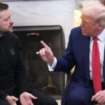 Donald Trump holds up his hand as he scolds Volodymyr Zelenskyy in a meeting.