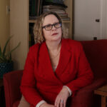 Kerry Doyle in a red suit
