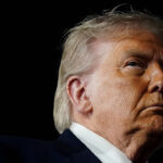 President Donald Trump looks at John F. Kennedy International Airport in New York, U.S., June 8, 2026. REUTERS/Nathan Howard