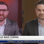 Two men in suits appear in a split-screen video call, deep in discussion about the upcoming midterms. The headline reads, THERE IS NO BLUE WAVE COMING. A banner below promotes a discount code for PreSleep.co.