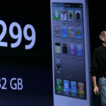 Steve Jobs stands on stage in a display of innovation, backed by a giant screen showing an iPhone with a $299 price tag and 32 GB of storage.