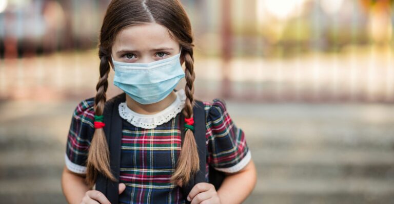 Schools, Universities Bringing Back Mask Mandates, Shutdowns