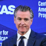 Gavin Newsom grimaces at an event for Center for American Progress