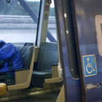 A passenger naps on a train at the MacArthur BART station in Oakland, Calif. on Tuesday, May 12, 2020. BART is joining transit agencies from around the country in seeking economic federal relief funds because of dwindling ridership during the coronavirus shutdown. (Photo By Paul Chinn/The San Francisco Chronicle via Getty Images) Crime