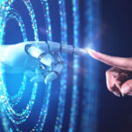 Graphic showing a robotic AI-driven hand reaching through rings of blue light to touch forefingers with a human hand.