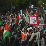 Anti-Israel protesters rally against an Israeli real estate event at Young Israel Synagogue of Midwood, Brooklyn, New York, May 11. (Photo by Selcuk Acar/Anadolu via Getty Images)