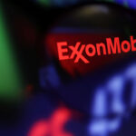 A graphic with red ExxonMobile against dark background.