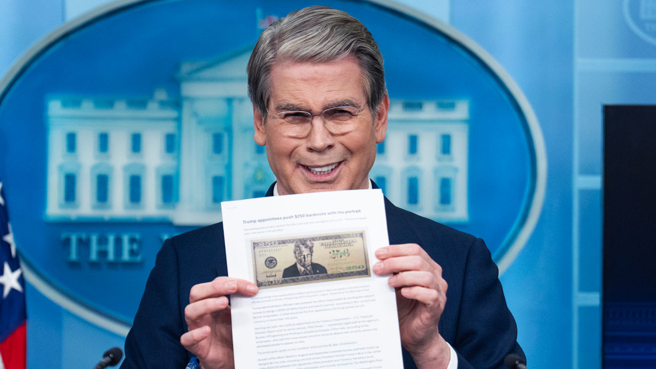 UNITED STATES - MAY 28: Treasury Secretary Scott Bessent holds a printout of a proposed $250 bill featuring a picture of President Donald Trump, during the White House press briefing where he addressed Trump Accounts, the war in Iran, and inflation among other issues, on Thursday, May 28, 2026. (Tom Williams/CQ-Roll Call, Inc via Getty Images)