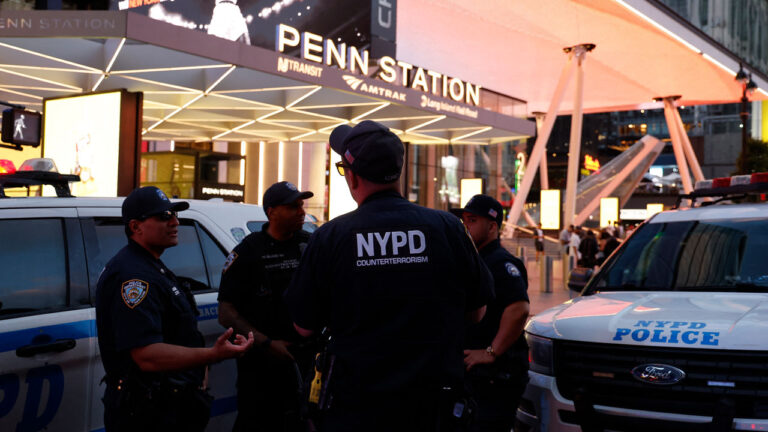 NYPD police officers are seen outside Penn Station in New York on June 7, 2026. Five people were wounded Sunday in a stabbing at New York's Penn Station, according to the city fire department, which said all victims were transported to hospital and the attacker was "in custody." The victims were all civilians, including one person with serious injuries, the New York Fire Department said in a statement. (Photo by John Lamparski / AFP via Getty Images)