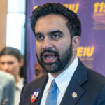 Zohran Mamdani talks to reporters at SEIU event.