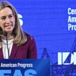 Mikie Sherrill in a red blazer at a podium in front of a blue and white backing reading Center for American Progress and "IDEAS."