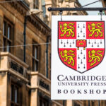Cambridge University Press bookshop signpost off Market Square in Cambridge city center, Cambridgeshire, England, UK. (Photo by: Andrew Michael/Education Images/Universal Images Group via Getty Images)