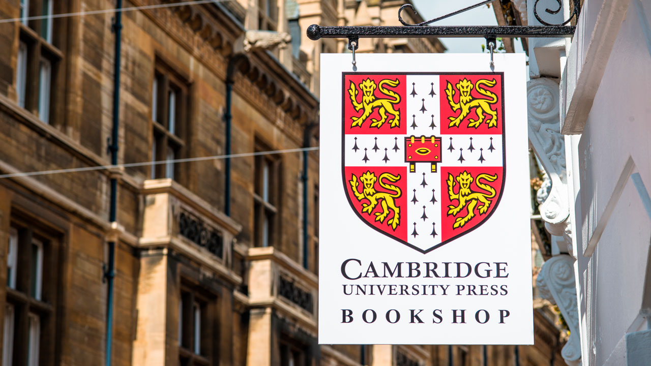 Cambridge University Press bookshop signpost off Market Square in Cambridge city center, Cambridgeshire, England, UK. (Photo by: Andrew Michael/Education Images/Universal Images Group via Getty Images)