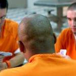 Should State Funding Go to School Books or Orange Jumpsuits?