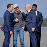 President Donald Trump greeting Burt Jones at Russell Regional Airport on February 19, 2026 in Rome, Georgia.