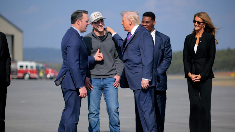 President Donald Trump greeting Burt Jones at Russell Regional Airport on February 19, 2026 in Rome, Georgia.