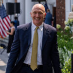 BEDMINSTER, NEW JERSEY - AUGUST 15: Former Trump Campaign foreign policy adviser Carter Page walks outside before Republican presidential candidate, former U.S. President Donald Trump holds a news conference outside the Trump National Golf Club Bedminster on August 15, 2024 in Bedminster, New Jersey. Trump’s campaign leaders announced they were expanding his staff as the reelection campaign heads in to its final few months. (Photo by Adam Gray/Getty Images)
