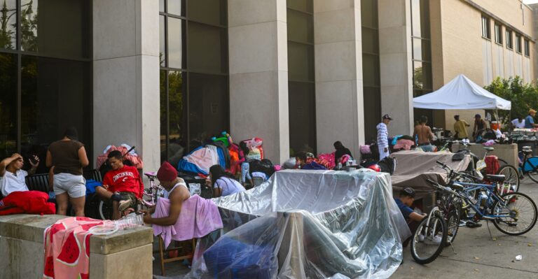 Biden’s Border Crisis Hits Chicago Hard, by Invitation 