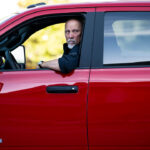 Rep. Chip Roy of Texas arrives in a red pickup truck for votes in the U.S. House.
