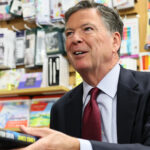 Author James Comey, former FBI Director, signs copies of his books for fans at the Barnes & Noble Upper West Side on May 19, 2025 in New York City. Comey sat with Esposito to discuss his career and new book "FDR DRIVE," the third of a series of fictional crime novels featuring attorney Nora Carleton. (Photo by Michael M. Santiago/Getty Images)