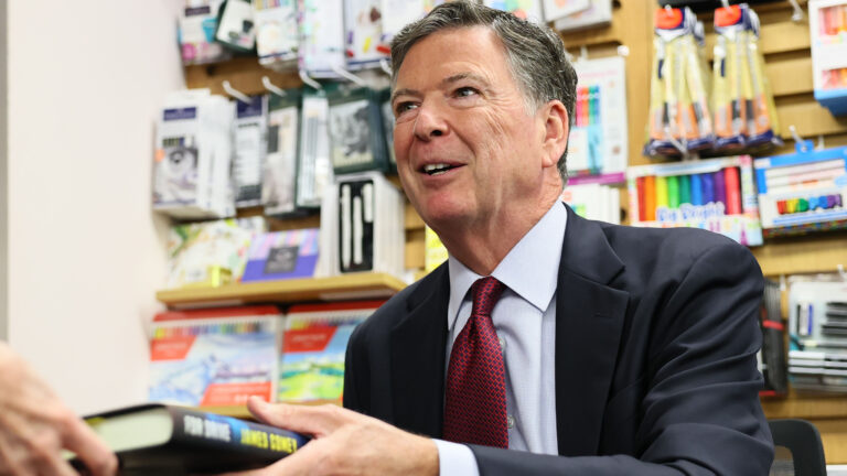 Author James Comey, former FBI Director, signs copies of his books for fans at the Barnes & Noble Upper West Side on May 19, 2025 in New York City. Comey sat with Esposito to discuss his career and new book "FDR DRIVE," the third of a series of fictional crime novels featuring attorney Nora Carleton. (Photo by Michael M. Santiago/Getty Images)