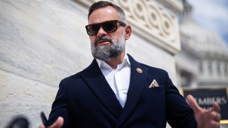 Cory Mills, R-Fla., talks with reporters on the House steps of the U.S. Capitol.