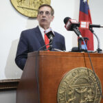 Georgia secretary of state and gubernatorial candidate Brad Raffensperger speaks to members of the media on prima election day on May 19 in Atlanta. (Megan Varner/Getty Images)