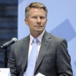 Kevin Guskiewicz seated