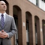 Steve Descano standing outside