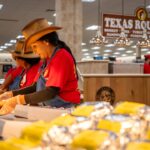 Employees prepare food inside of the Buc-ee's convenience store
