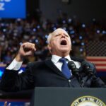 You Can't Cancel Tim Walz's Radicalism With Camo Hats or Ice Fishing