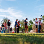 Arizona residents wait in line to vote early at the Indian Bend Wash Visitor Center on October 30, 2024.